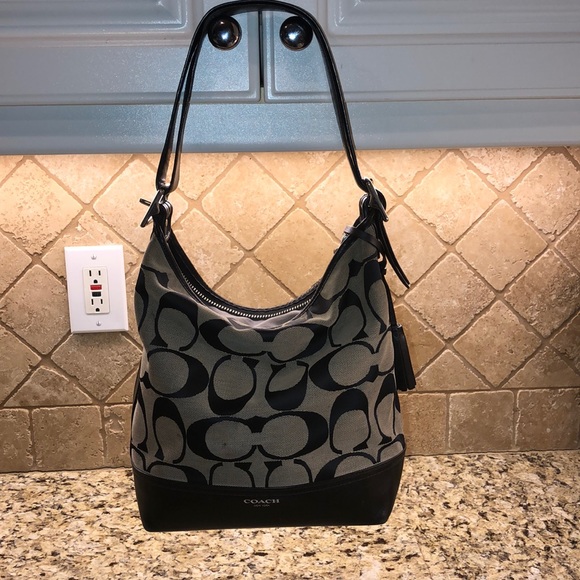 Coach Handbags - Coach signature. Good used condition.